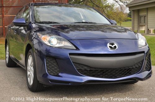 The 2012 Mazda 3i Grand Touring sedan front end