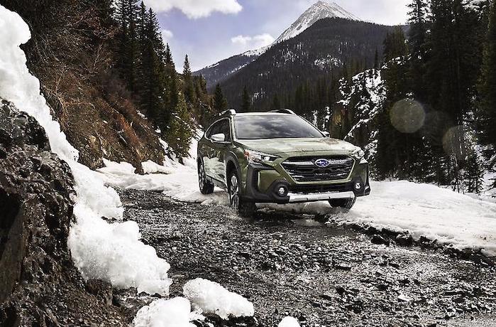 2024 Subaru Outback on a snow covered mountain pass