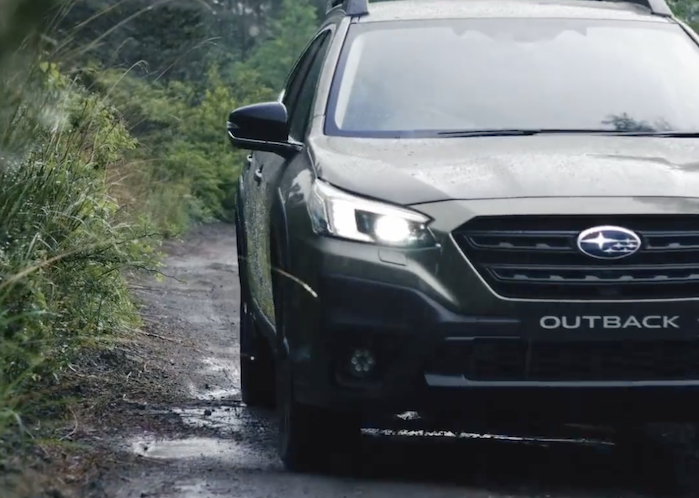 2024 Subaru Outback front view in the mud