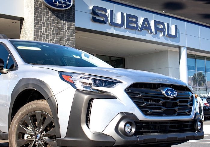 2024 Subaru Outback sitting on a dealer's lot 
