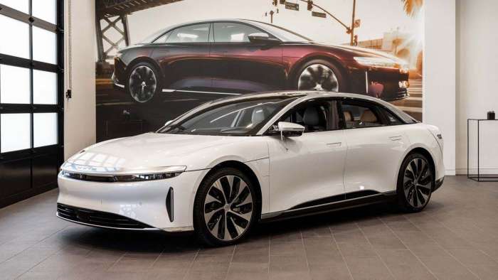 A white Lucid Air is pictured inside Lucid's Millbrae, California sales studio.