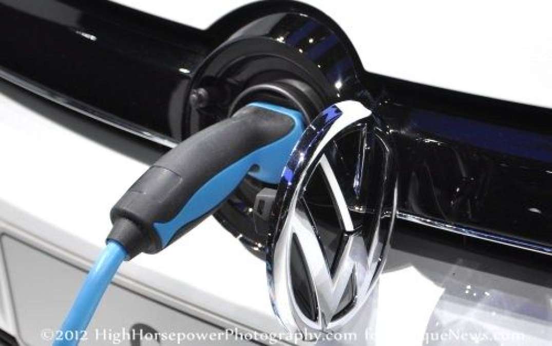 The VW logo hides the charging port on this plug-in concept.