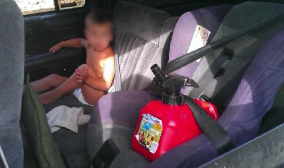 Baby and Gas Can