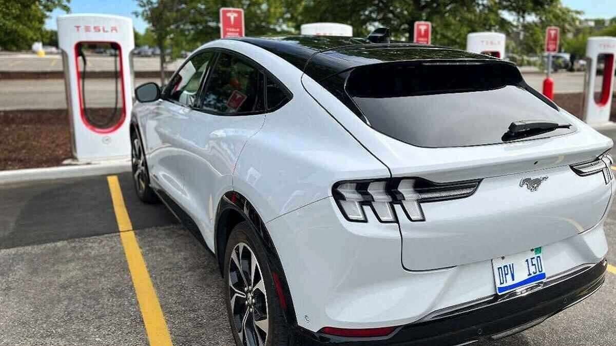 Mustang Mach-E Charging at a Tesla station