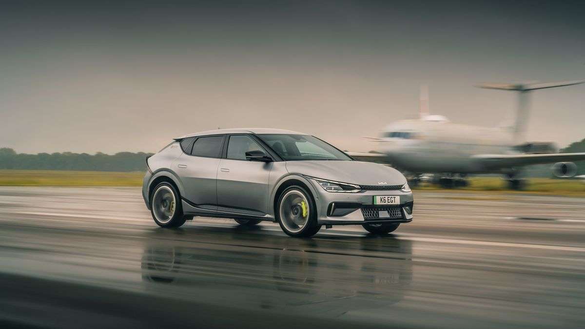 Image of a Kia EV6 GT being driven at speed on a runway.