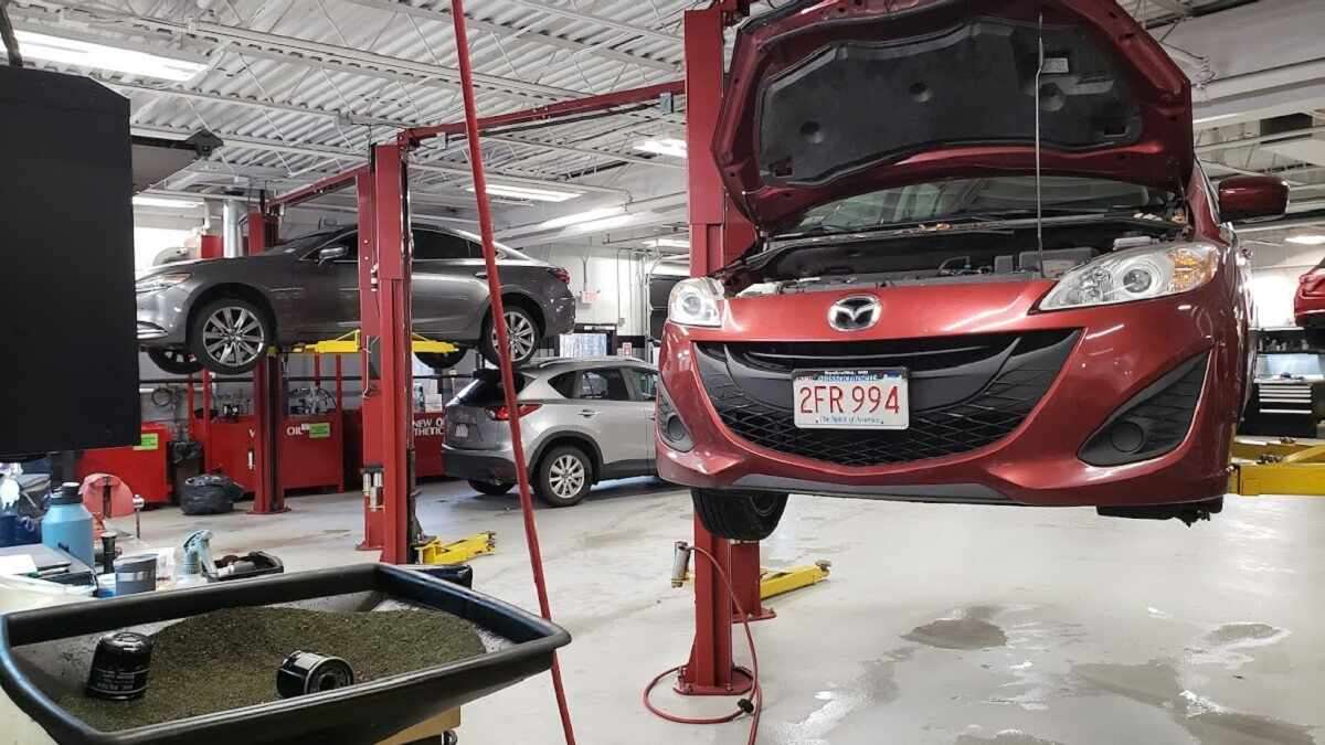 Image of Mazda vehicles being serviced by John Goreham
