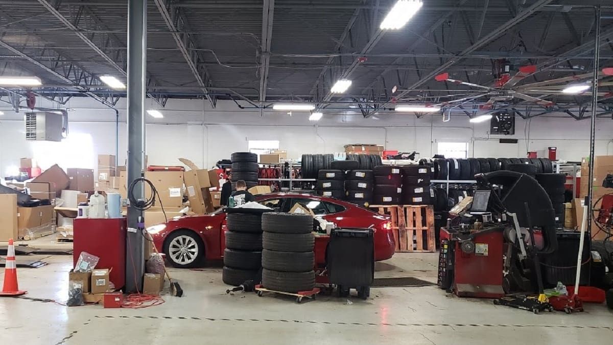 Image of Tesla service area with tires by John Goreham