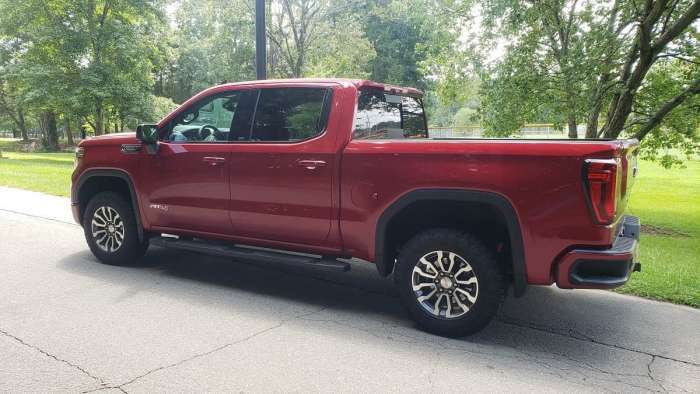 2020 GMC Sierra AT4 1500 side view red color.