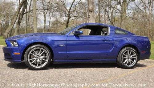 The 2013 Ford Mustang GT Premium Coupe from the side