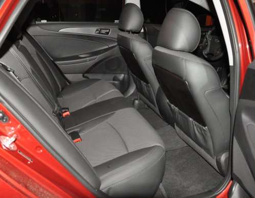 The rear seating area of the 2012 Hyundai Sonata SE, shown in black.