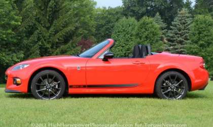 The side profile of the 2013 Mazda MX-5 Club with the top down
