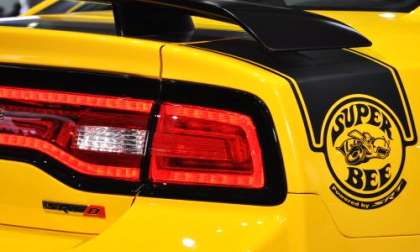 A close up look at the rear quarter panel badging of the 2012 Dodge Charger SRT8