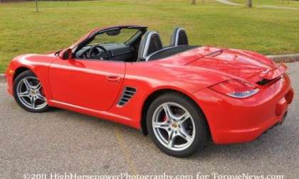 The 2012 Porsche Boxster S from the back with the top down