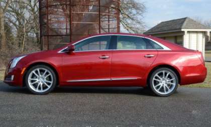 The side view of the 2013 Cadillac XTS AWD Premium 