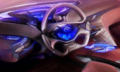 The dash and steering wheel of the new Hyundai i-oniq concept