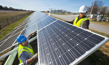 Solar panels are placed to complete BMW Manufacturing's new Solar array