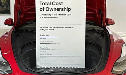 Tesla Center Sign Total Cost of Ownership of a Tesla Is Less Than a Toyota and BMW