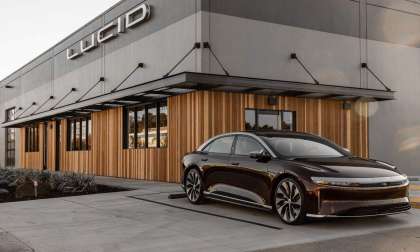 A red Lucid Air is pictured parked outside of Lucid's Millbrae, CA Studio.