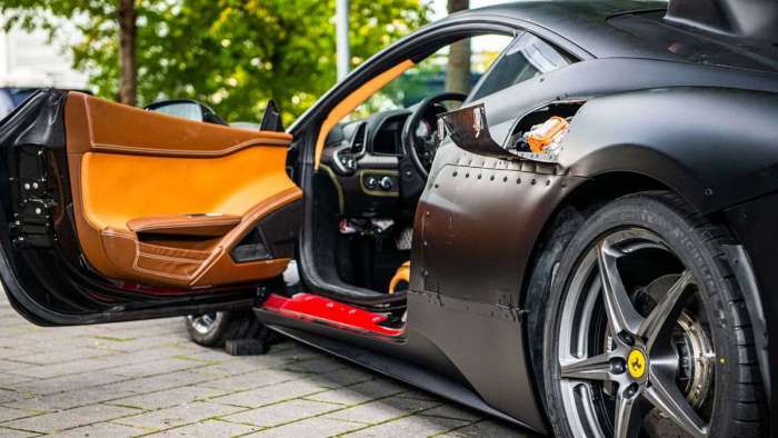 Image showing the leather-lined door of the LaFerrari prototype with one of the added access doors in the car's flank open.