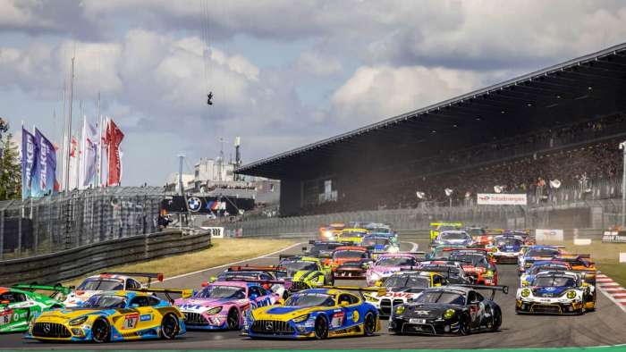 Image showing the fastest cars bunched together at the start of the 2022 running of the Nurburgring 24 hour race.