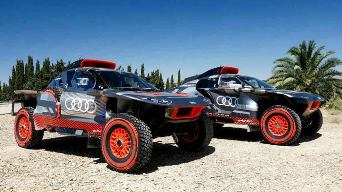 Image of the Audi RS Q e-tron E2 parked beside the previous version of the vehicle.