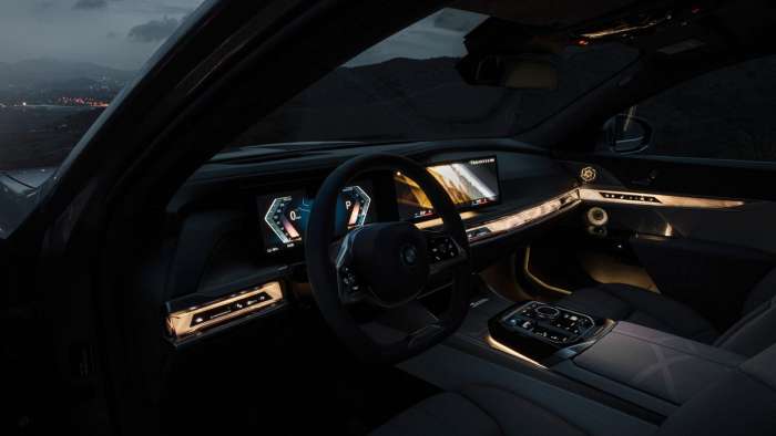 Image showing the dash and cabin of the new 7 Series lit up at night and looking futuristic