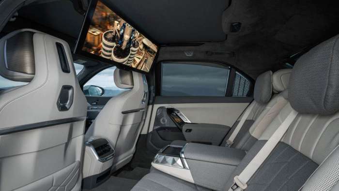 Image showing the gigantic theatre screen in the back of the new BMW 7 Series.