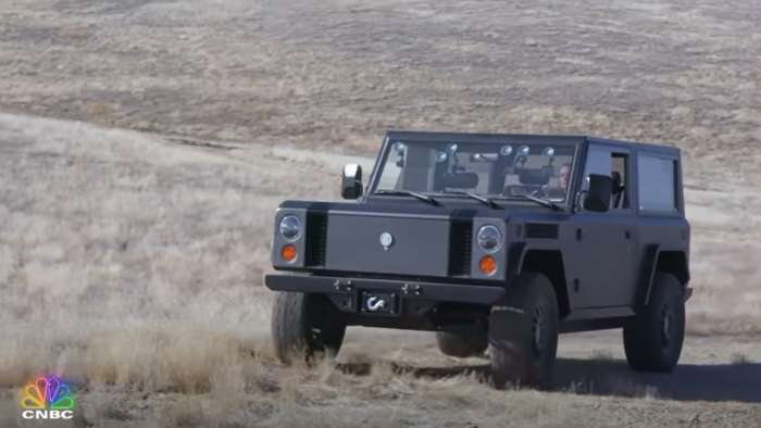 Image showing a black Bollinger EV SUV off-roading during an episode of Jay Leno's Garage