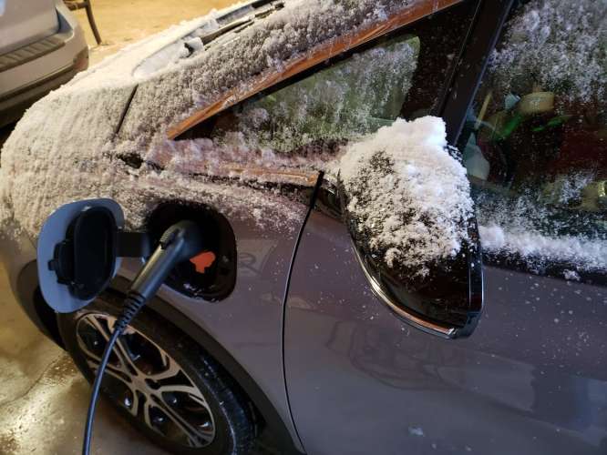 Chevy Bolt charging in winter image by John Goreham
