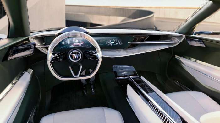 Interior view of the Buick Wildcat EV showing its clean, streamlined design with lightweight flat-bottomed steering wheel.