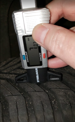 Image of Michelin CrossClimate2 tire and tread gauge by John Goreham