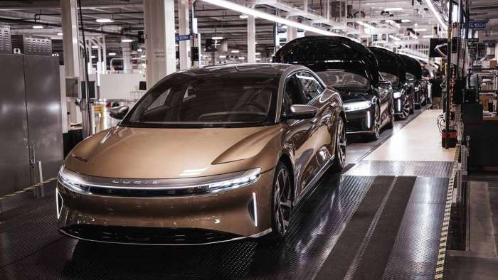 A Eureka Gold Lucid Air rolls off the production line at the AMP-1 factory in Arizona.