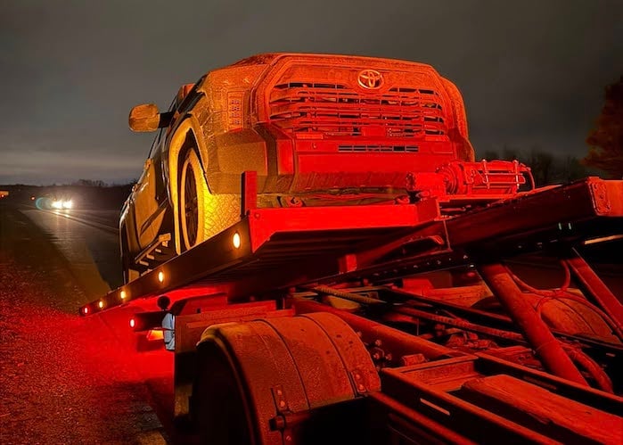 Tristan Corriveau's 2022 Toyota Tundra SR5 is being loaded on a tow truck