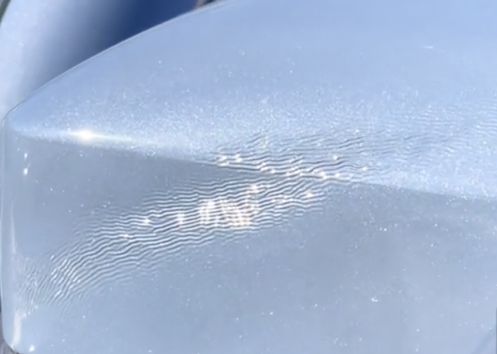 Jackie's 2023 Ford Bronco mirror with paint damage