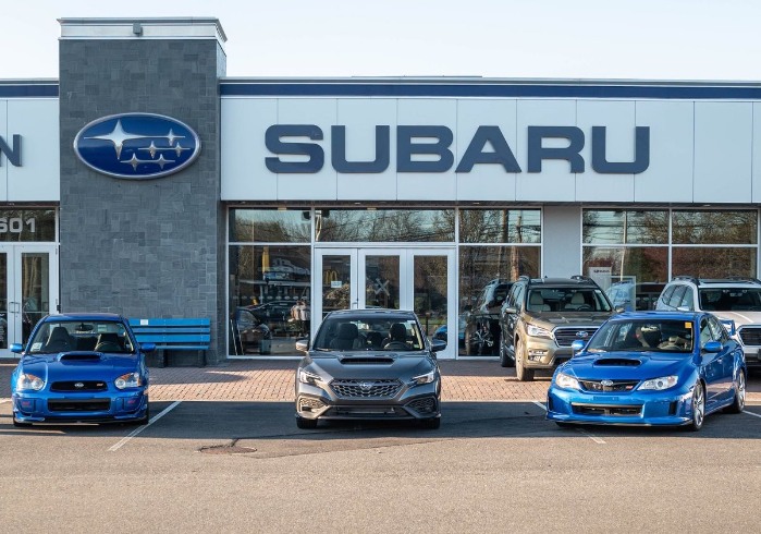 Subaru WRX and Subaru WRX STI models sitting on the dealers lot