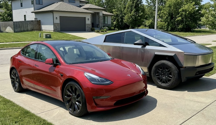 2023 Tesla Model 3 and 2025 Cybertruck in the driveway