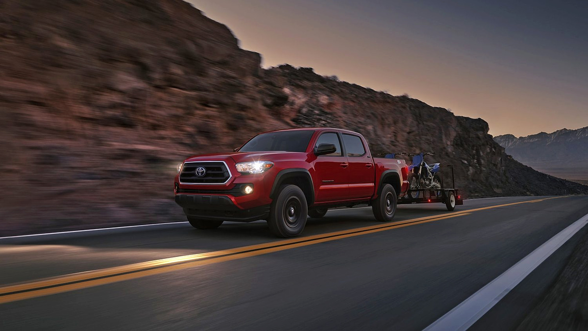 2017 Toyota Tacoma towing a small trailer