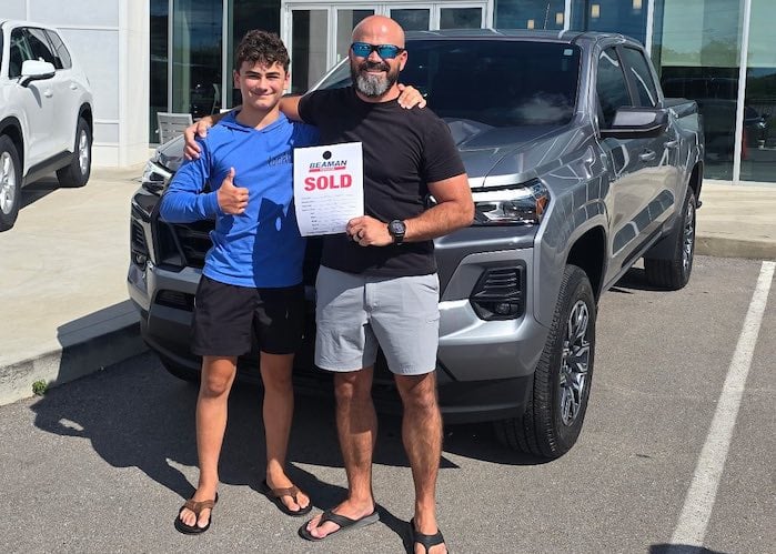 Dallas Tomlinson and his son with his 2024 Chevy Colorado