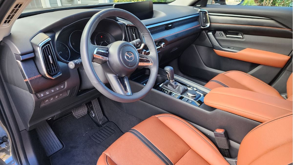 2024 Mazda CX-50 Review: front interior and infotainment