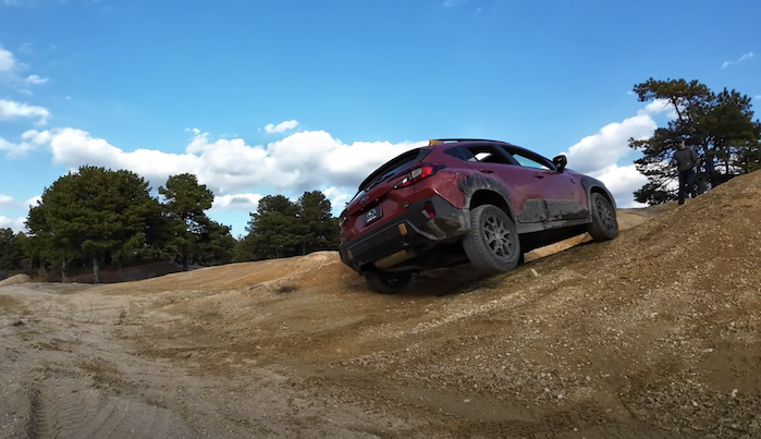 2024 Subaru Crosstrek Wilderness climbing a steep hill
