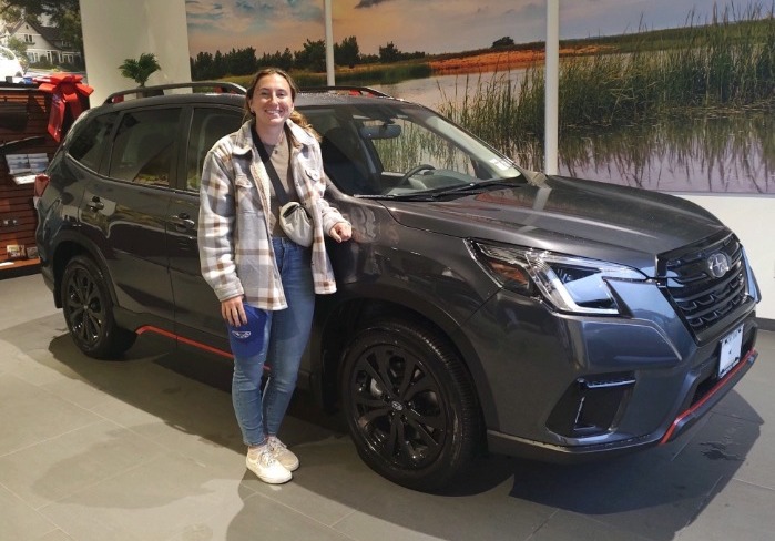 A customer with her 2024 Subaru Forester