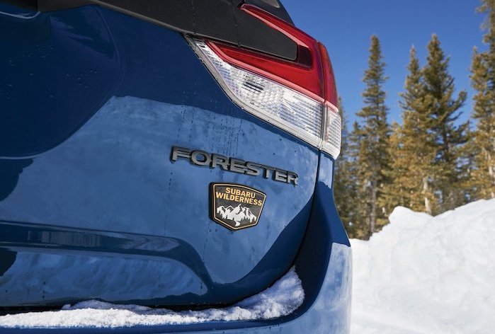 2024 Subaru Forester in a snowy mountain field