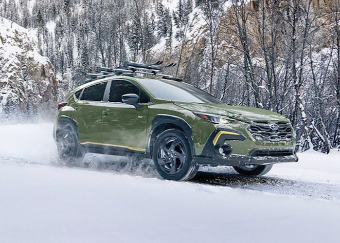 2024 Subaru Crosstrek driving in the snow