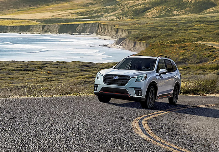 2024 Subaru Forester driving on the open highway