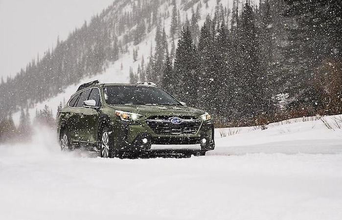 2024 Subaru Outback driving in deep snow