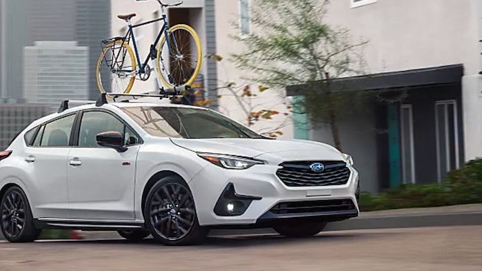 2024 Subaru Impreza driving in the city