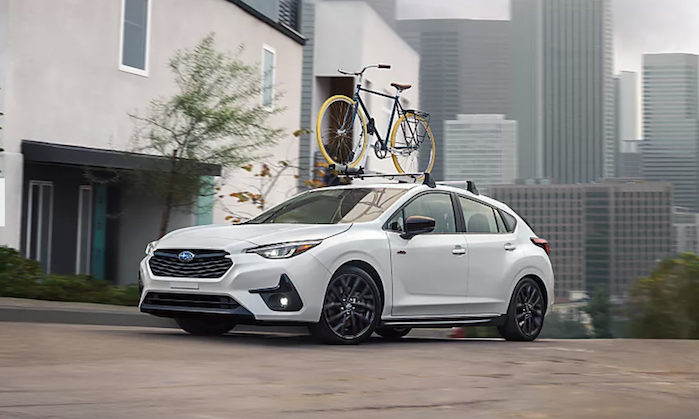 2024 Subaru Impreza driving in the city