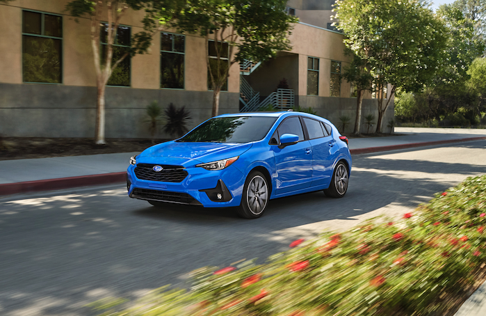 2024 Subaru Impreza driving in the city