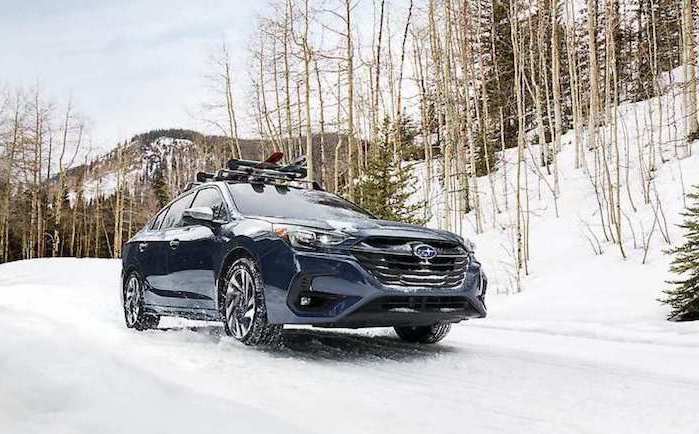 2024 Subaru Legacy driving in the snow