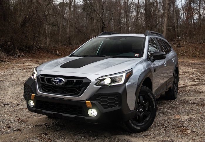 2024 Subaru Outback sitting in the woods